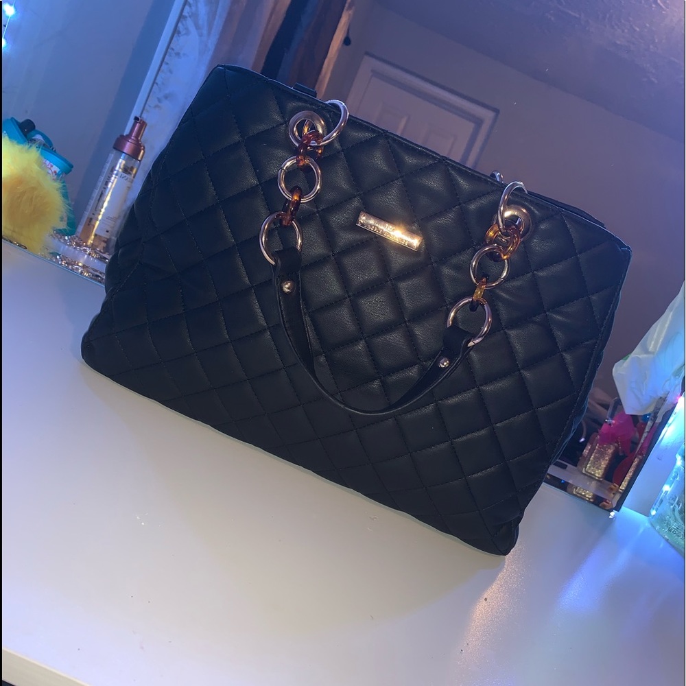 Black and gold purse
